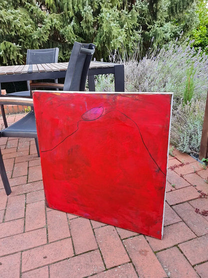 Abstraktes rotes Gemälde als Sinnbild für Ausgewogenheit
